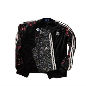 Adidas tracksuit - jacket is a Medium and leggings are a small
